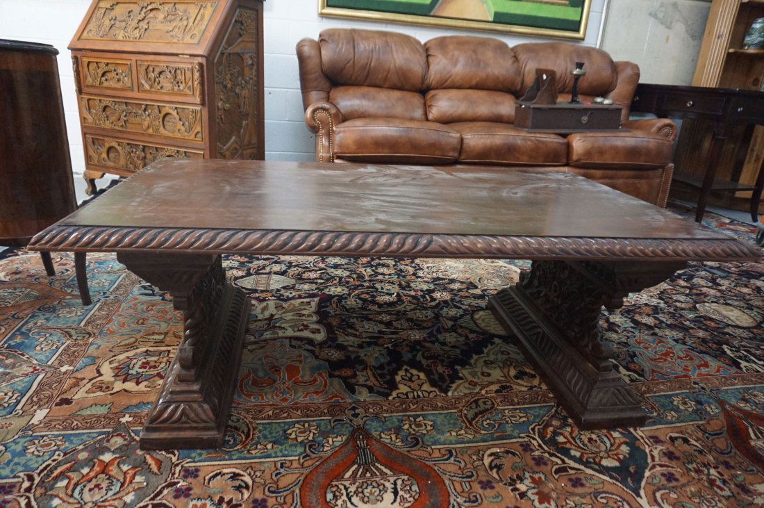 Carved Coffee Table with Pierce Carved Legs: Carved wood coffee table with pierced carved legs. Measures 52" long and 19" tall