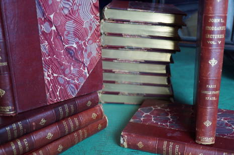 Set of 14 Leatherbound Books By John Stoddard: Set of 14 ox blood red leather bound and gold embossed books by John L. Stoddard. John Lawson Stoddard (April 24, 1850 - June 5, 1931) was an American writer, hymn writer and lecturer who gained popul