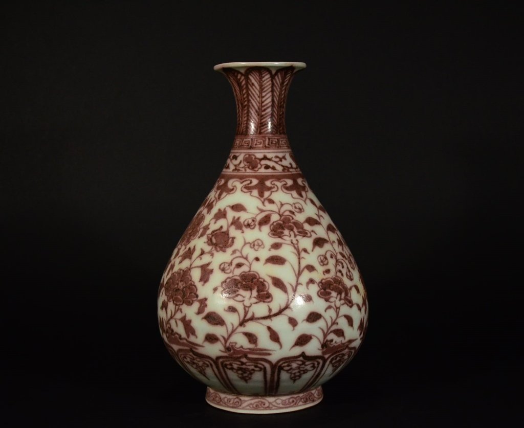 A COPPER RED FLOWER VASE (1 of 6)