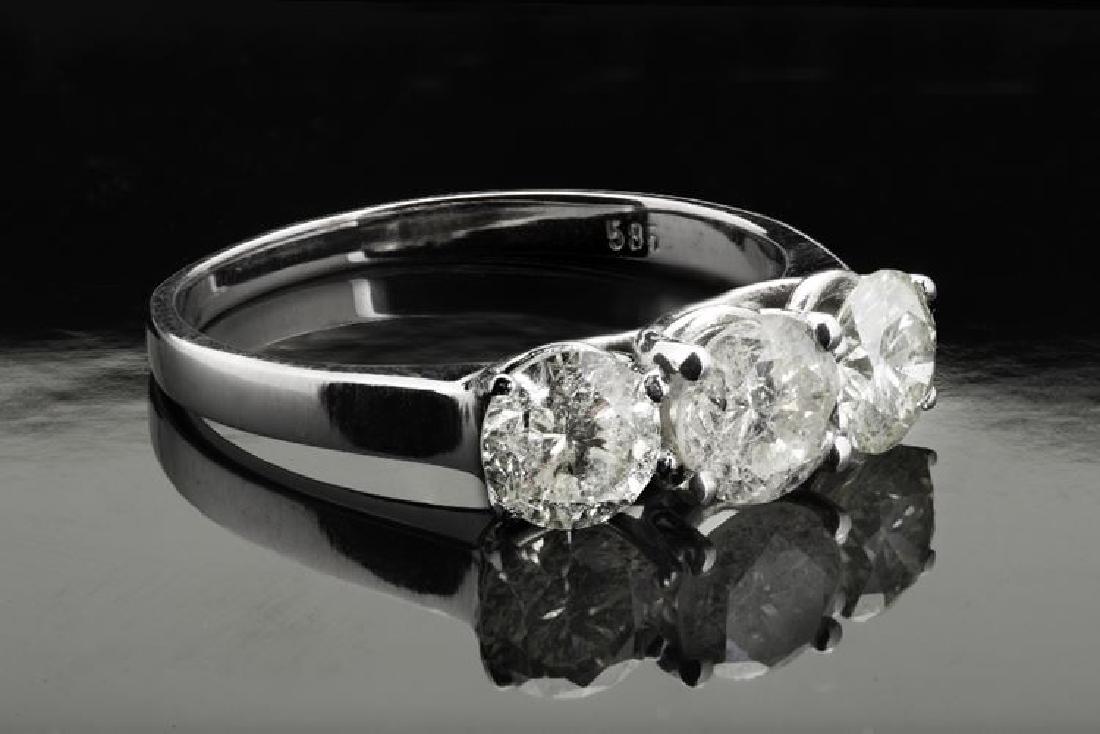 A new & certified 1.70 Ct 3 stone diamond ring set on (1 of 5)