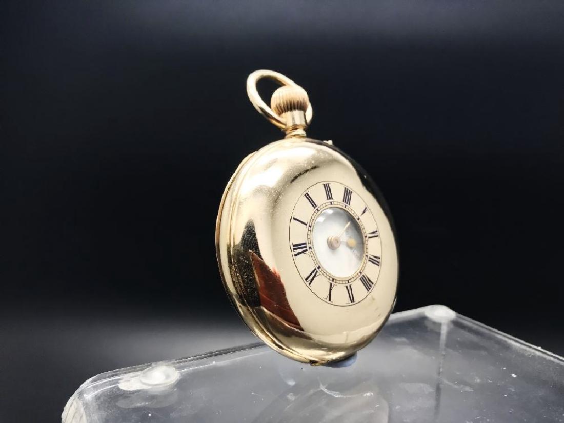 A 18ct gold plated full hunter pocket watch: A full hunter pocket watch. Gold plated case. keyless wind three quarter plate movement with club tooth lever escapement. White dial. 53mm
