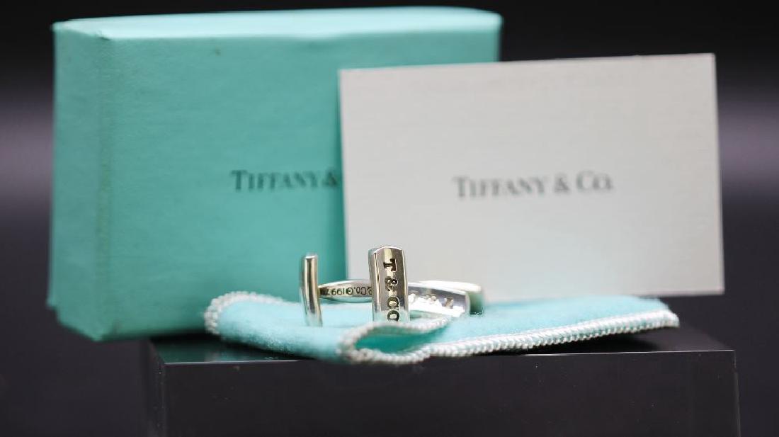 A pair of hallmarked silver Tiffany & Co cufflinks RRP (1 of 4)