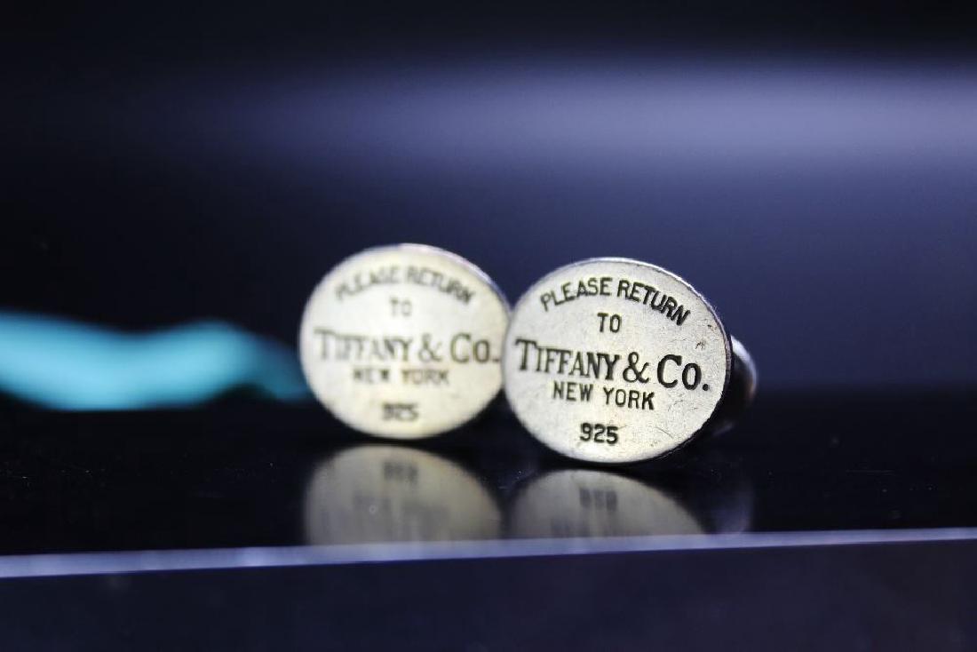A pair of hallmarked silver Tiffany & Co cufflinks RRP (1 of 3)