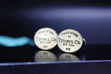 A pair of hallmarked silver Tiffany & Co cufflinks RRP: A pair of hallmarked silver Tiffany & Co cufflinks RRP Â£249, boxed etc