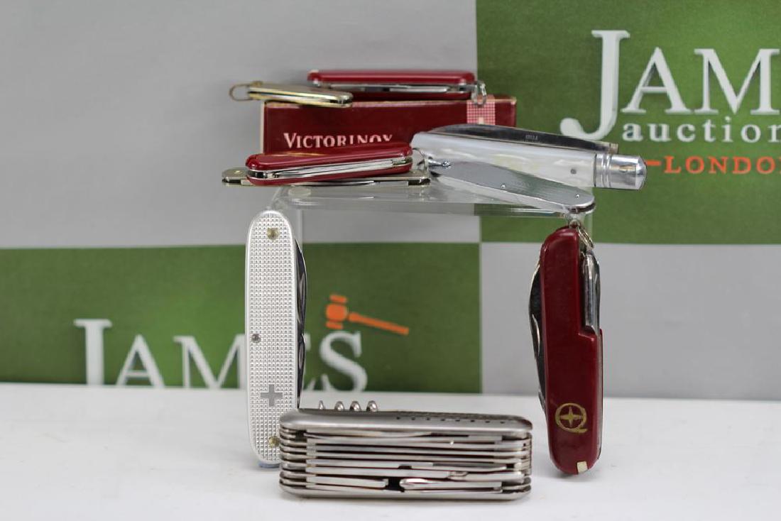 A collection of ex display Victorinox pen knives with (1 of 3)