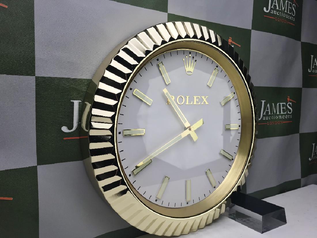 A Rolex wall clock (1 of 3)