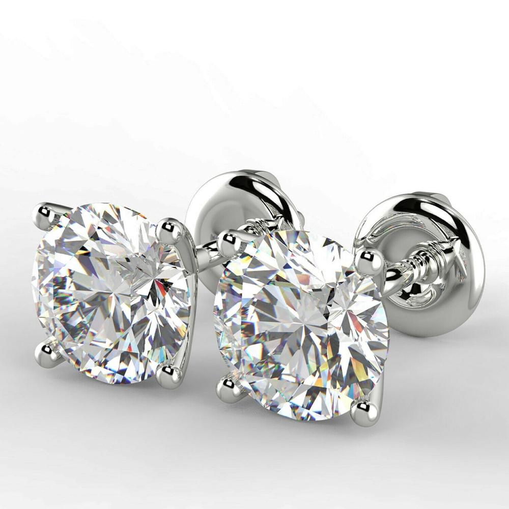 Pair of New 1.46 Carat Round Cut VS1/D Diamond Stud: Pair of New 1.46 Carat Round Cut VS1/D Diamond Stud Earrings On 14K Hallmarked White Gold, supplied with GIE certification including valuation of £7450.00