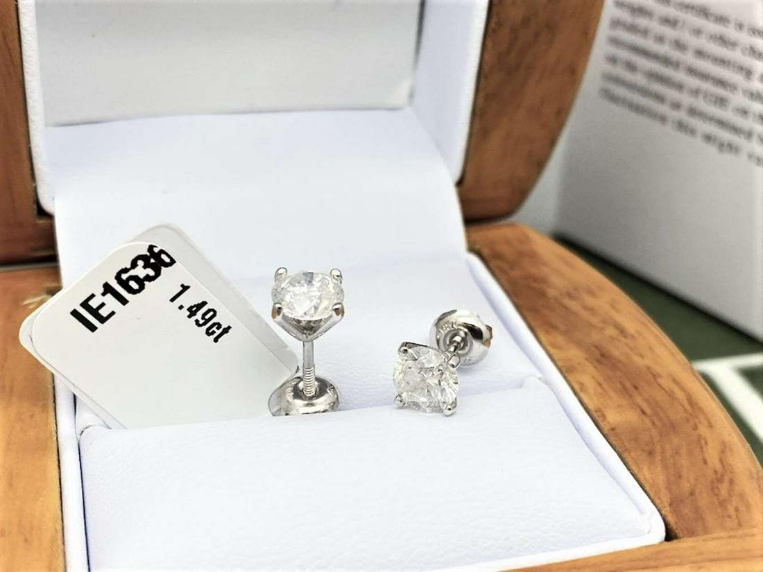 Pair of New 1.49 Carat Round Cut VS2/D Diamond Stud: Pair of New 1.49 Carat Round Cut VS2/D Diamond Stud Earrings On 14K Hallmarked White Gold, supplied with GIE valuation certificate of £6850.00