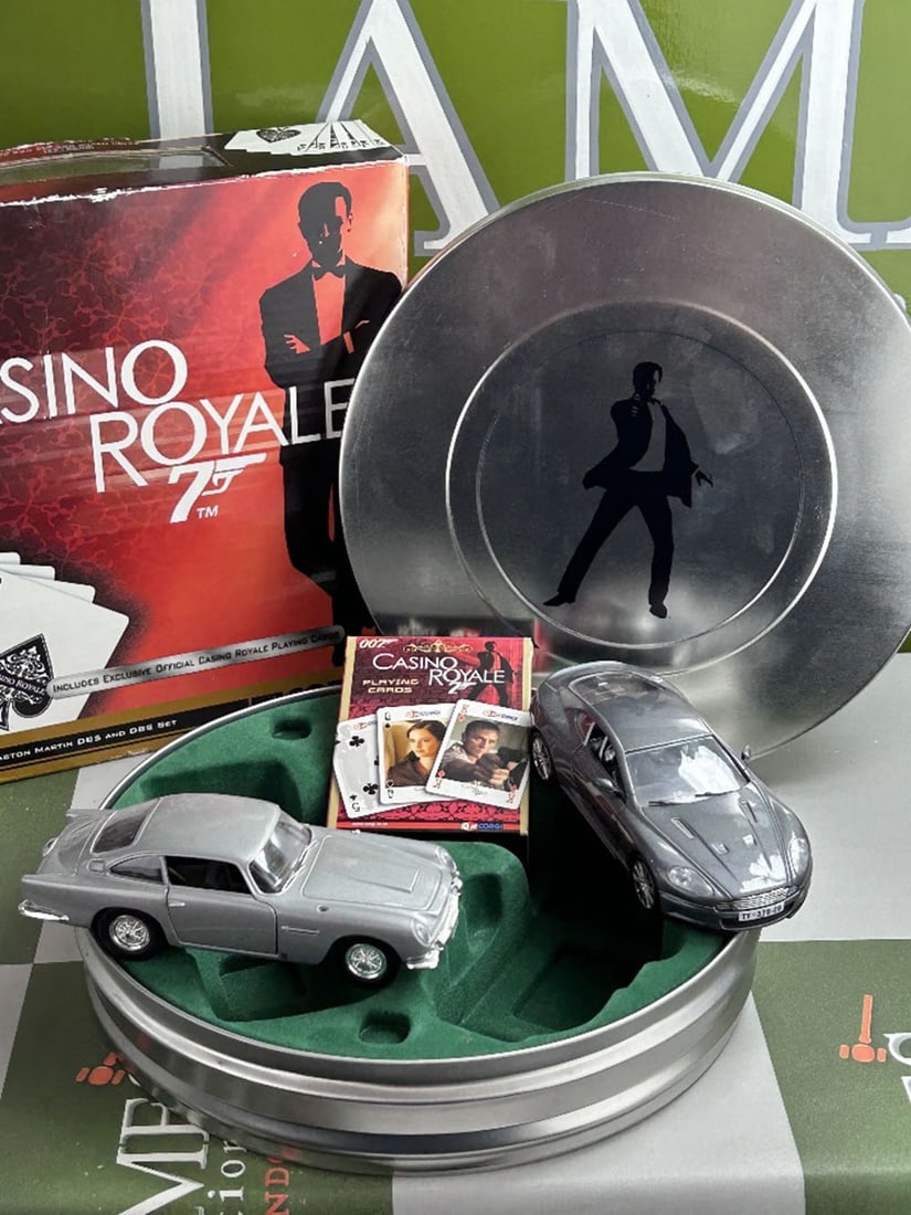 James Bond 007 Casino Royal Aston Martin Car Set: James Bond 007 Casino Royal Aston Martin Car Set 1/36 Scale in film canister & outer box as pictured, playing cards included.