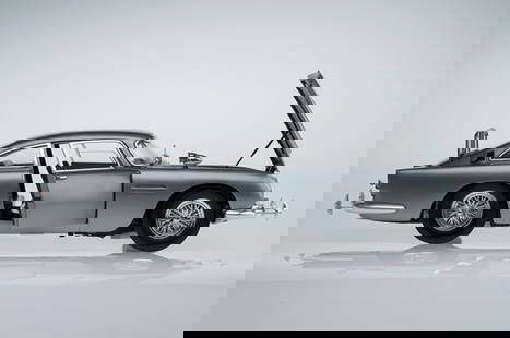 Hand Built Eaglemoss 1:8 Scale James Bond 1964 Aston Martin DB5, Goldfinger, Thunderball etc: Hand Built Eaglemoss 1:8 Scale James Bond 1964 Aston Martin DB5, Goldfinger, Thunderball etc, stunning example. these lots feature working parts such as engines noise, lights , guns fitted as per the