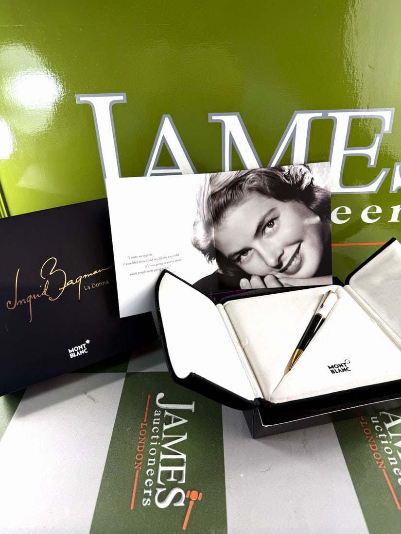 Montblanc Ingrid Bergman La Donna Special Edition Ballpoint Pen. 104907 Amethyst Stone Example: Montblanc Ingrid Bergman La Donna Special Edition Ballpoint Pen. 104907, as pictured a mint example complete with all paperwork, packaging etc.The pen features a black precious resin barrel, a cream-c