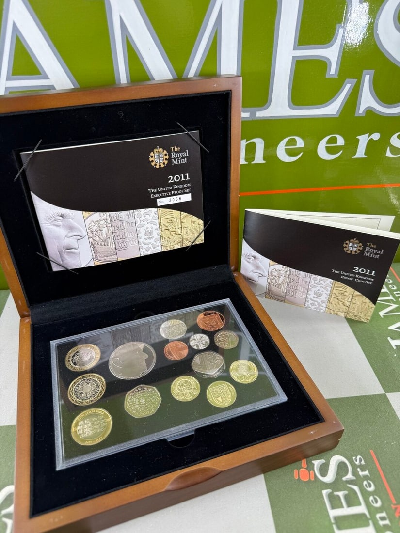 SOLD VIA BUY IT NOW-PLEASE DO NOT BID-Royal Mint 2011 UK Executive Coinage Set In Original Case: Royal Mint 2011 UK Executive Coinage Set In Original Case- As pictured a mint example with full certification and wooden case.