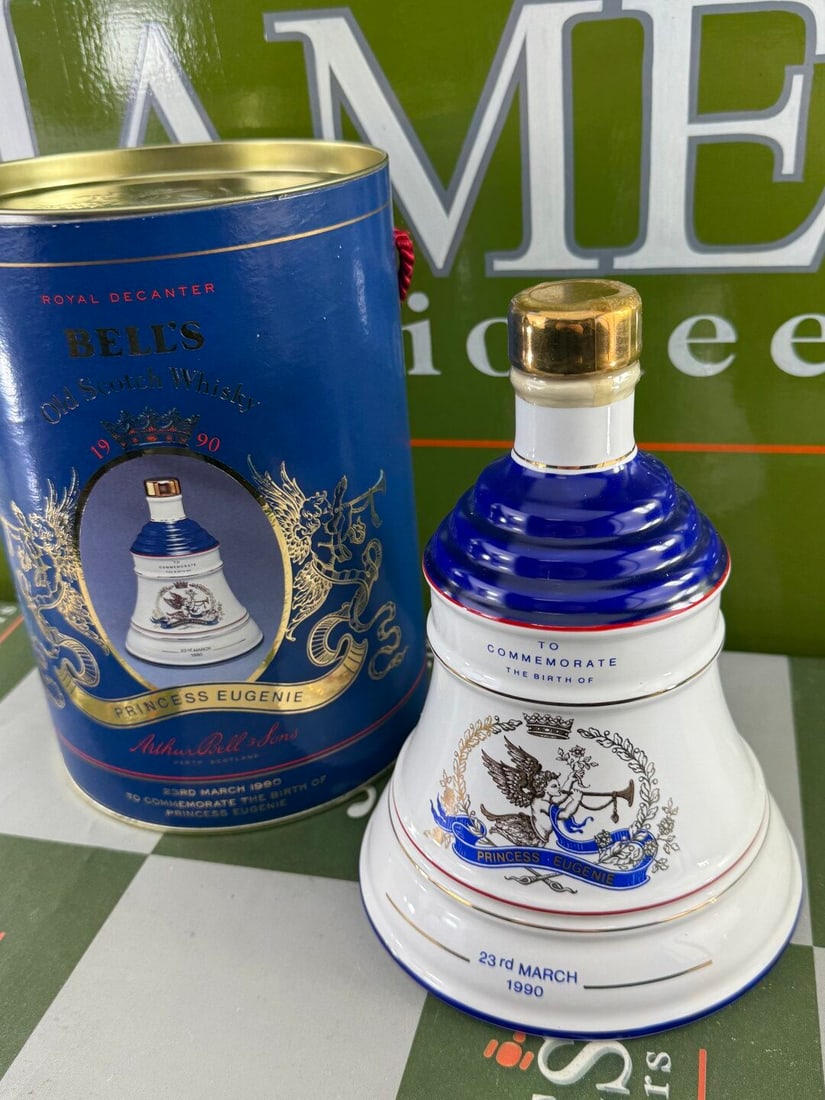 Bells Old Scotch Whiskey 24 Carat Gold Princess Eugenie Birthday Edition 1990: Bells Old Scotch Whiskey 24 Carat Gold Princess Eugenie Birthday Edition 1990-Sealed and unopened for pictures only. Porcelein decanter in original packaging 70ck 40% proof whiskey