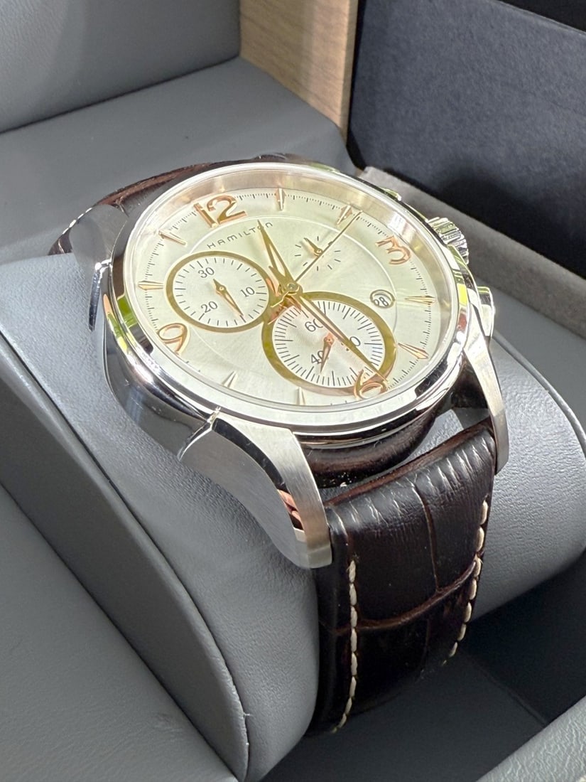 Hamilton Jazzmaster Rose Gold Chronograph Edition: Hamilton - Jazzmaster Chrono-Stainless steel case. Quartz movement. Silvered dial with arrowhead hour markers, quarterly Arabic numerals, subsidiary seconds dials to two, six and ten, date aperture to