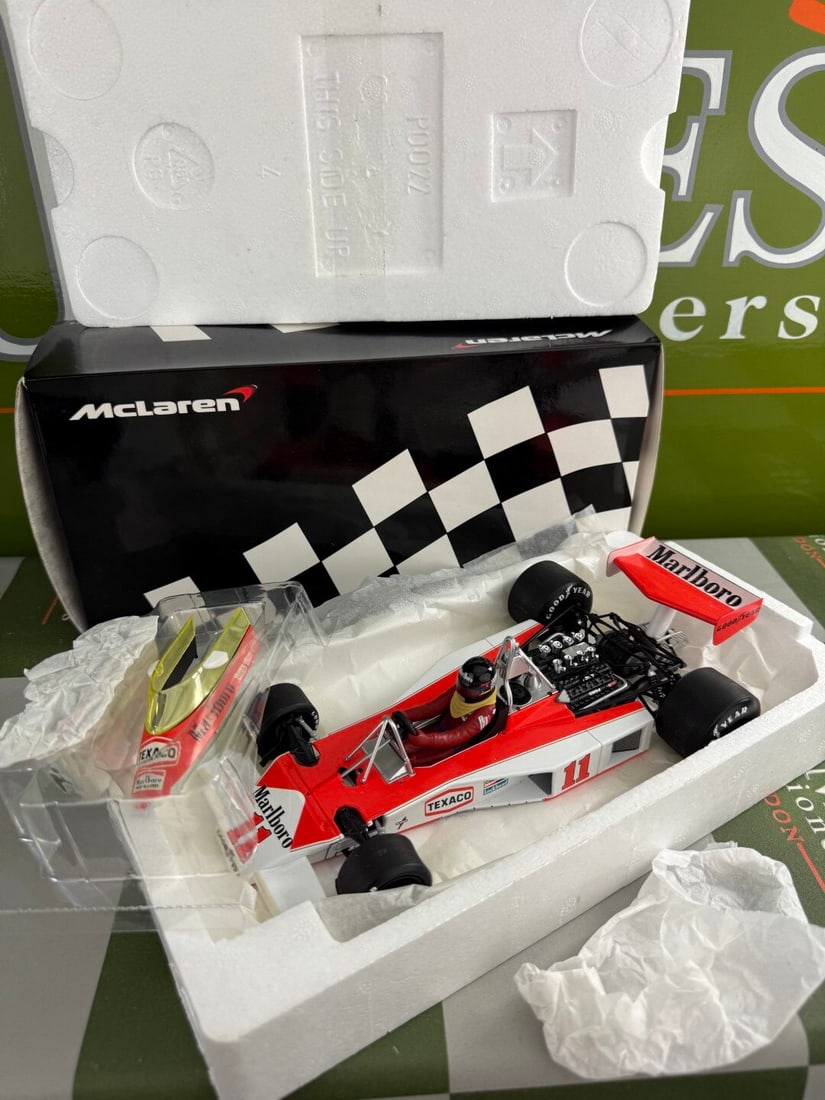 McLaren Ford M23 -J. Hunt 1976 Ltd Edition of 750 Models: Minichamp 1:18 Scale McLaren Ford M23 -J. Hunt 1976 Ltd Edition of #286/750 Models 530 761821 A rare undisplayed example complete as pictured with original packaging.