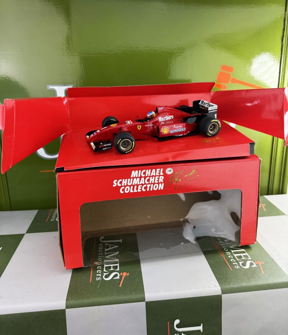 Michael Schumacher 1:18 Collection Ferrari F 310: Michael Schumacher 1:18 Collection Ferrari F 310- A rare undisplayed example complete as pictured with original packaging