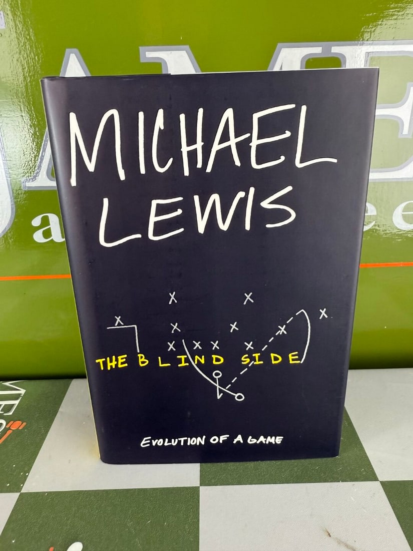 `The Blind Side` Hardback Edition By Micheal Lewis: `The Blind Side` Hardback Edition By Micheal Lewis, mint example removed from a recent book shop closure.