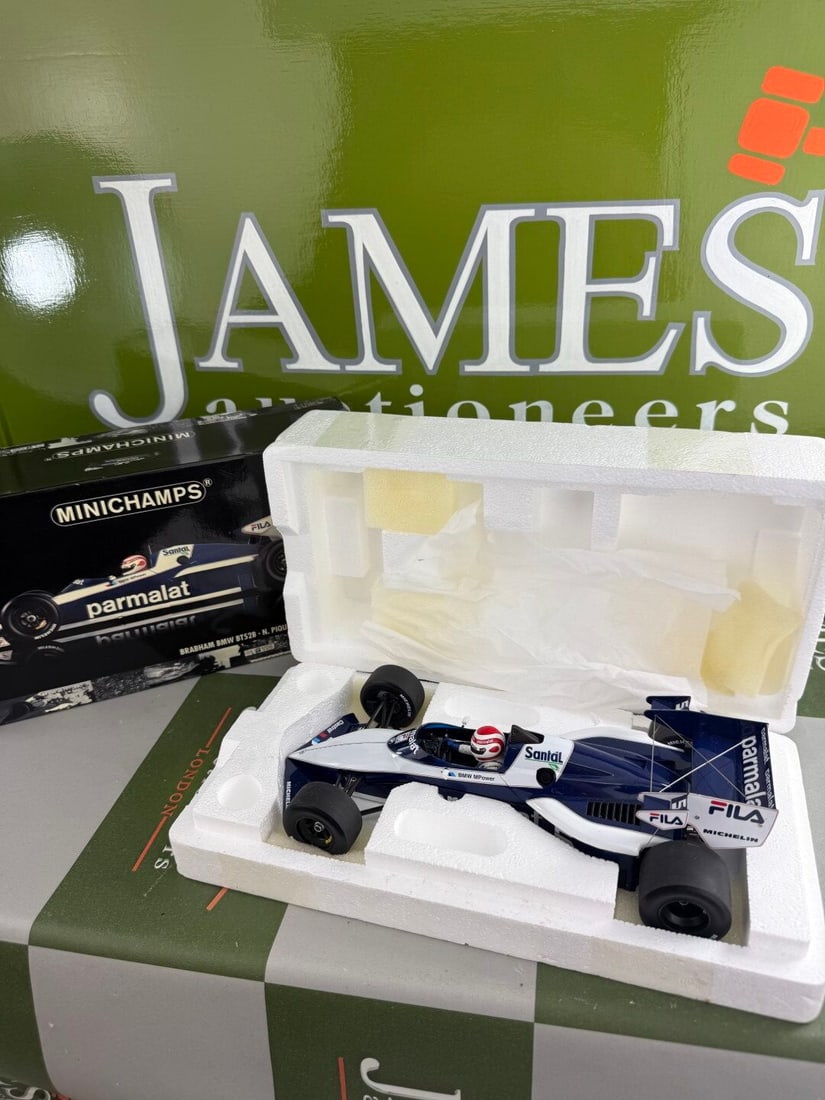 Minichamps 1:18 Brabham BMW (N. Piquet) World Champion 1983: Minichamps 1:18 Brabham BMW BT52B (N. Piquet) World Champion 1983- A rare undisplayed example complete as pictured with original packaging.Mint Example.