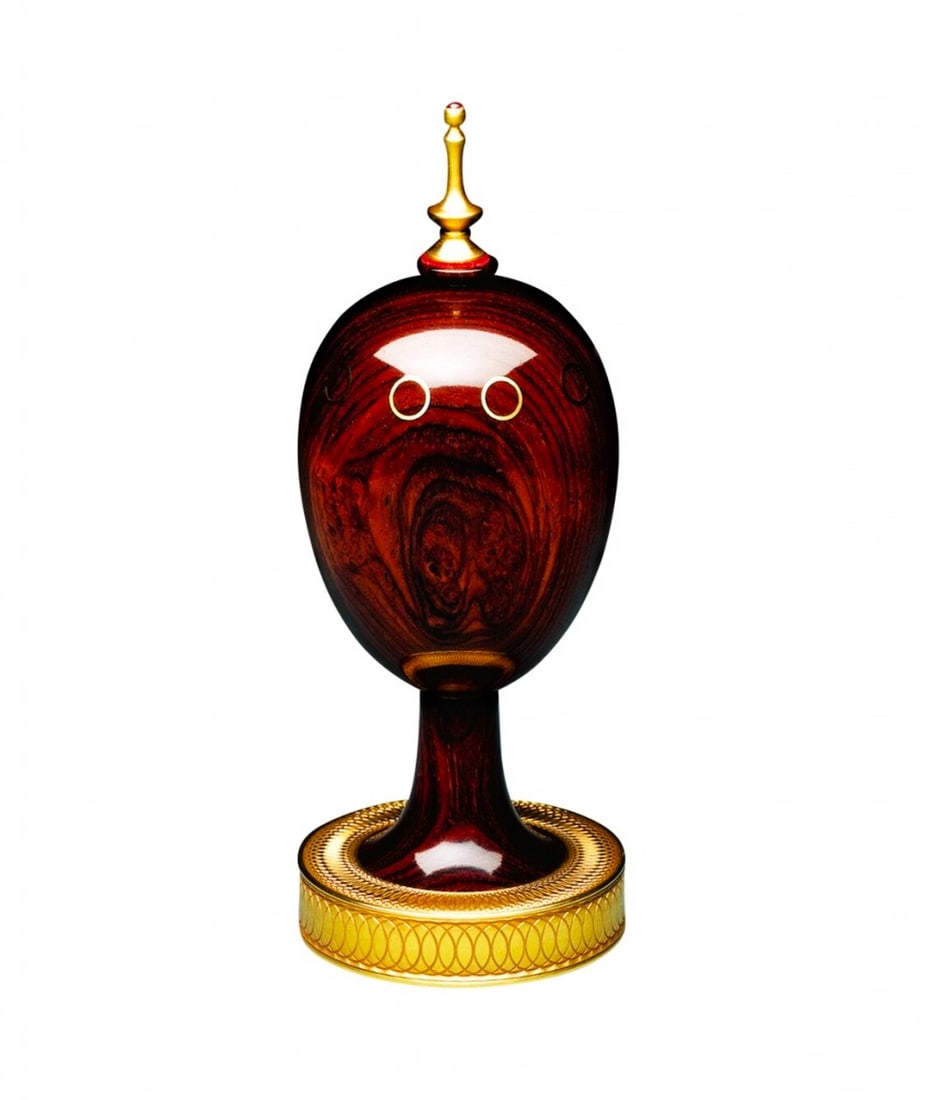 Theo Faberg St Petersburg Collection Cocobolo Wood Egg & 24ct Gold Plated Finish: A Cased Theo Fabergé St Petersburg Collection Cocobolo wood egg with 24ct gold plated finial and base, The Scribe Egg was the first of Theo Fabergé's creations for The St. Petersburg