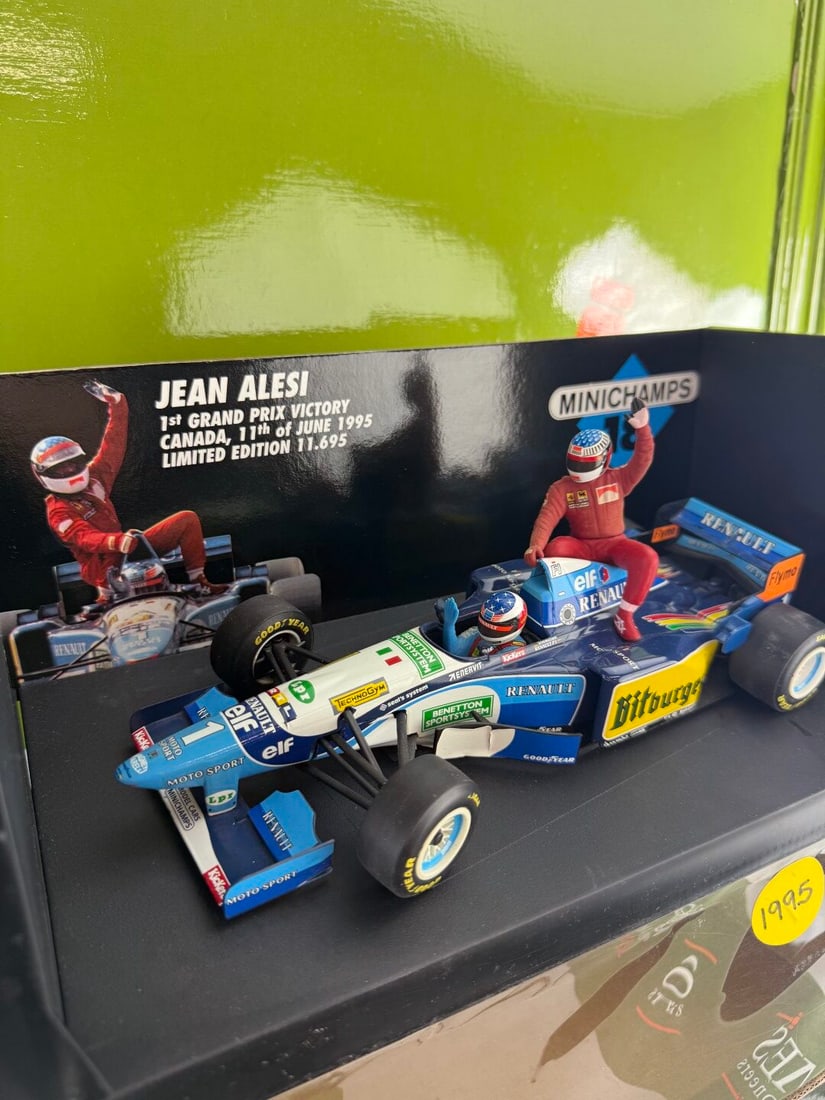 Minichamps 1:18 Jean Alesi 1st Grand Prix Victory Canada 1995: Minichamps 1:18 Jean Alesi 1st Grand Prix Victory Canada 1995- A rare undisplayed example complete as pictured with original packaging-Mint Example.