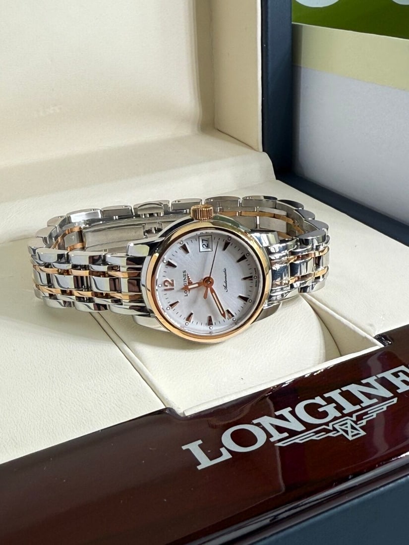 SOLD VIA BUY IT NOW-PLEASE DO NOT BID-Longines Saint Imier Rare Automatic Rose Gold Edition: Longines - Saint Imier Stainless steel case with rose metal bezel and exhibition case back. Signed automatic calibre L595.2. Silvered dial. Fitted to a signed bi-metal bracelet with double folding