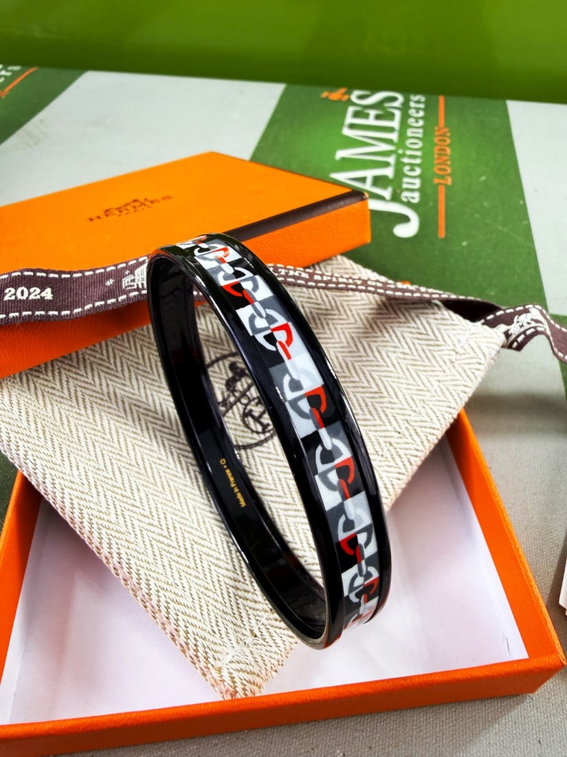 Hermes Paris Black Enamel Monogram Link Edition: Hermes Paris Black Enamel Monogram Link Edition, as pictured mint example with original packaging and dimensions 17cm etc.