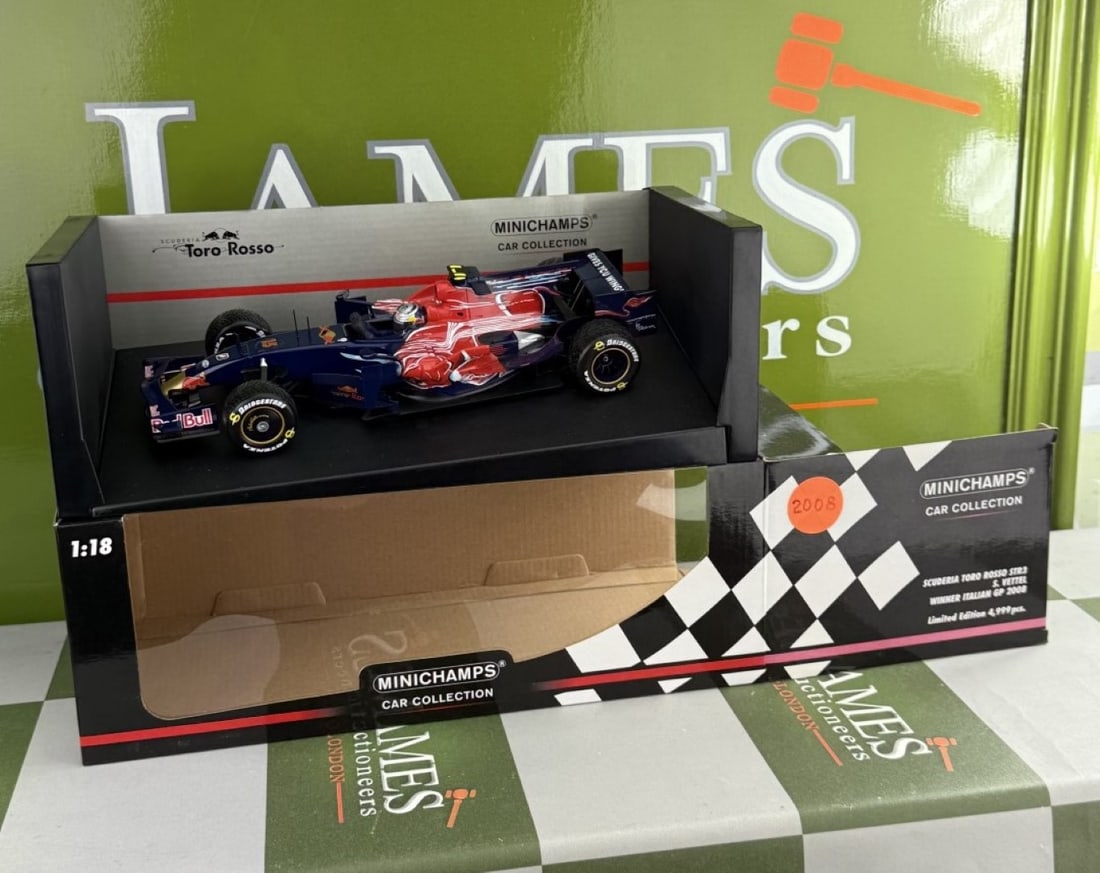 Minichamps 1:18 Toro Rosso STR3 S Vettel winner Italian GP 2008: Minichamps 1:18 Toro Rosso STR3 S Vettel winner Italian GP 2008 -A rare undisplayed example complete as pictured with original packaging-