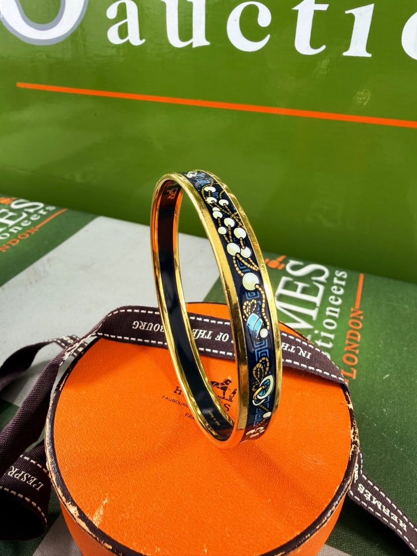 Hermes Paris Gold & Enamel Monogram Navy Bracelet: Hermes Paris Gold & Enamel Monogram Navy Bracelet, as pictured for both dimensions and original packaging.