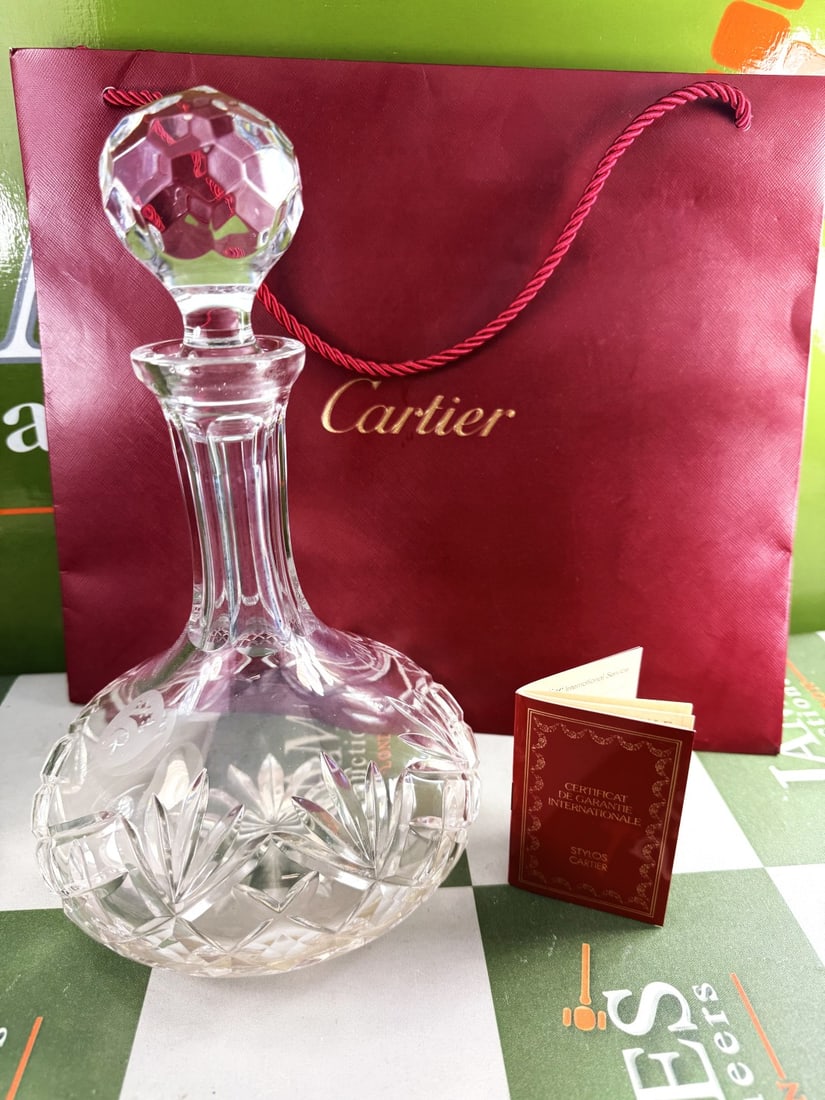 Cartier Paris Crystal Decanter -`The Roxburghe` Golfing Trophy Edition: Cartier paris Decanter 'The Roxburghe', height 28cm.Condition Report Originally a golfing trophy. The Cartier Paris Crystal Decanter, "The Roxborough" Golf Trophy Edition, is a distinctive, high-end c