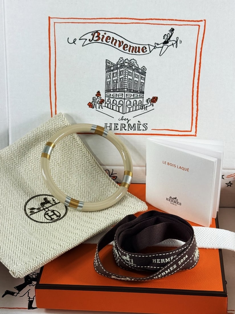 Hermes Paris H Equipe T2 Beige Gold Silver Bangle: Hermes Paris H Equipe T2 Beige Gold Silver Metallic Bangle appears unworn and a mint example with full Hermes packaging, dimensions pictured.