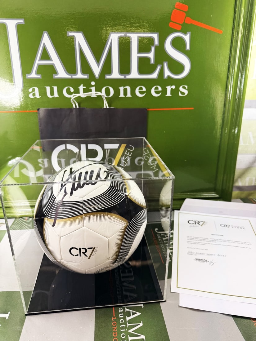 CR7 (Cristiano Ronaldo) Signed Ball & COA- Football Interest.: CR7 (Cristiano Ronaldo) Signed Ball & Certificate of Authenticity - Football As pictured supplied with what appears to be a new display case, bag from the Cr7 museum and certificate as pictured
