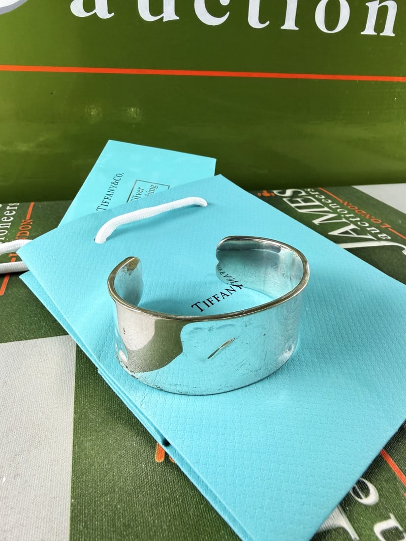 Tiffany & Co Wide Cuff `Love`Bracelet 925 Sterling Silver: Tiffany & Co Wide Cuff Bracelet 925 Sterling Silver. Dimensions and condition also pictured.circa 2003.