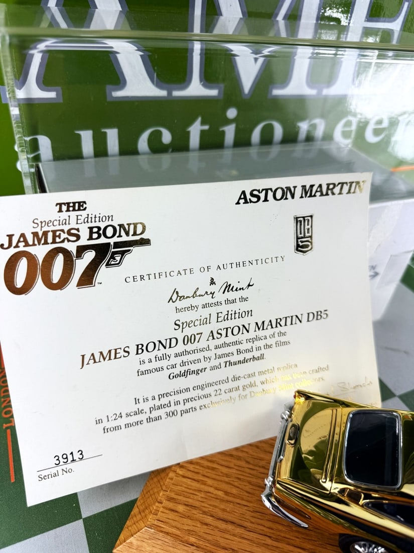 A Ltd Edition 22 Carat Gold Plated James Bond Aston Martin DB5 - 11