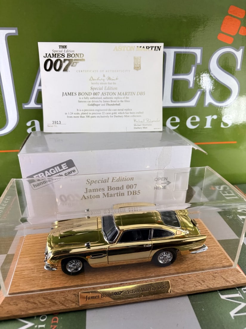 A Ltd Edition 22 Carat Gold Plated James Bond Aston Martin DB5 - 2