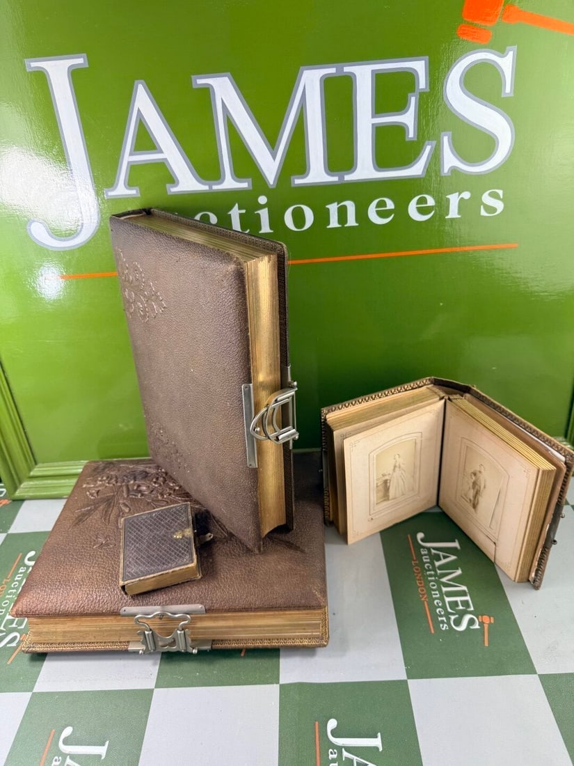 Vintage Gold Leaf Leather Bound Family Photo Albums With Metal Clasps: Vintage Gold Leaf Leather Bound Family Photo Albums With Metal Clasps, excellent condition and rare examples of historical life detailed family tree albums.Four in total. please examine pictures for