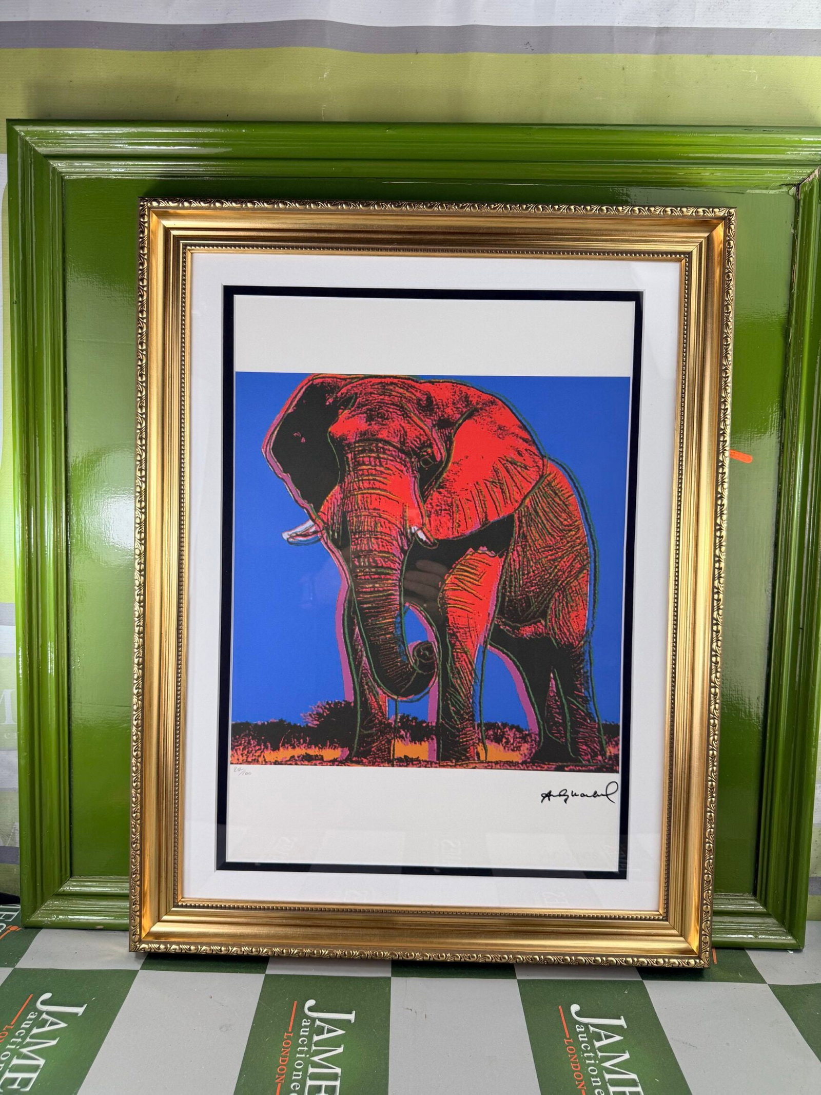 Andy Warhol-(1928-1987)`The Elephant` Numbered Lithograph #84/100: Andy Warhol-(1928-1987)`The Elephant` Numbered Lithograph #84/100 Professionally framed using museum quality perspex and double mount, gold finish ornate framed. Dimensions & number of limited pri