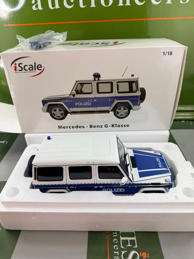 iScale 1:18 Mercedes G Class Polizei Edition.: iScale 1:18 Mercedes G Class Polizei Edition. A mint and rare example in original packaging.Items unpacked such as lights etc as pictured.