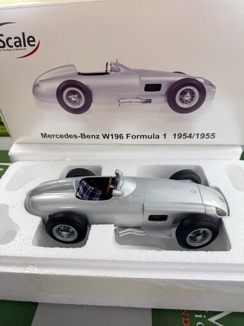 Mercedes Benz W196 Formula 1 iScale Die Cast 1:18 Scale: Mercedes Benz W196 Formula 1 iScale Die Cast 1:18 Scale, as pictured in generally excellent condition, internal packaging intact.