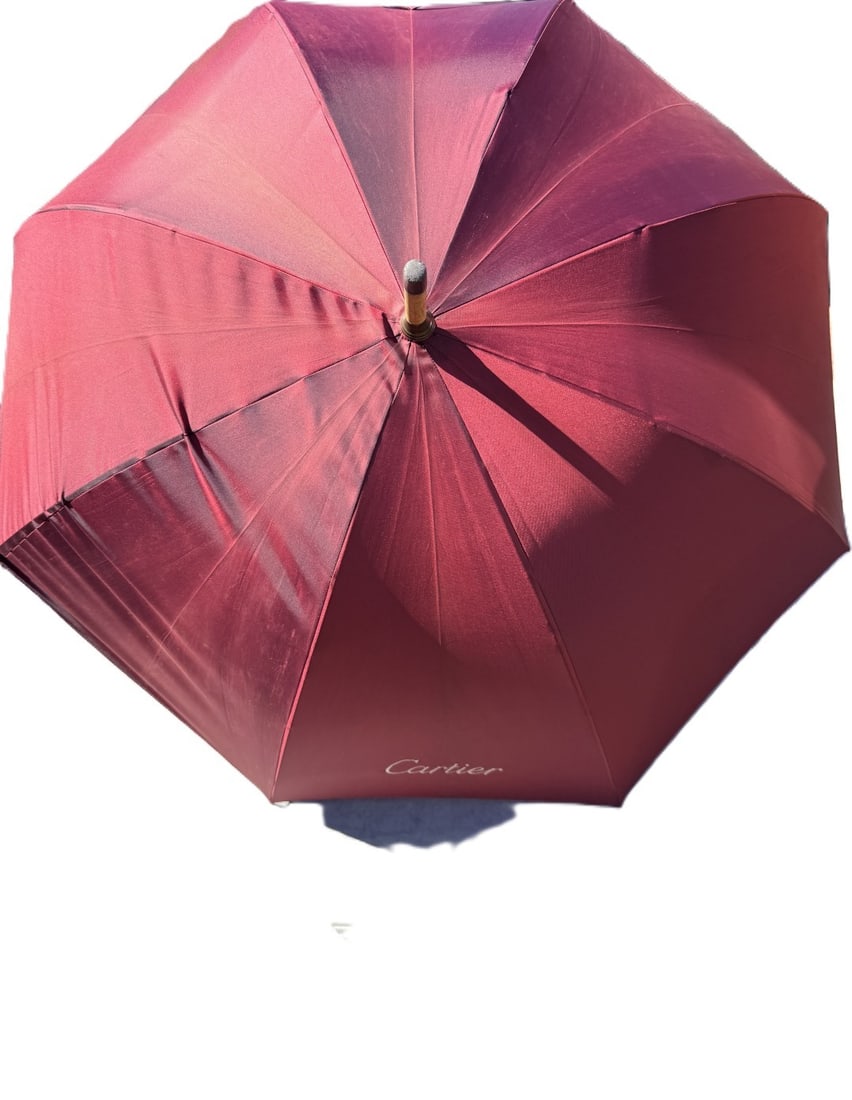 Cartier Paris Umbrella-Le Parapluie De Cherbourg Edition: Cartier Paris Umbrella-Le Parapluie De Cherbourg Edition, silk style finish in deep burgundy finish with wooden handle,