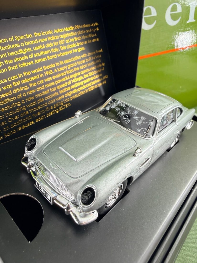James Bond 007 Corgi Aston Martin DB5 Diecast `Battle Edition`: James Bond 007 Corgi Aston Martin DB5 Diecast `Battle Edition`, mint example in original packaging from the Spectre film.