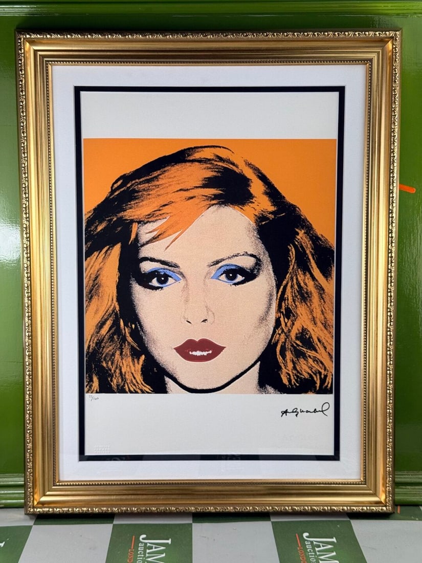 Andy Warhol-(1928-1987) Blondie Numbered Lithograph #25/100 Rare Example(Orange): Andy Warhol-(1928-1987) "Blondie" Numbered Lithograph #25/100 Rare Example. Professionally framed using museum quality perspex and double mount, gold finish ornate framed. Dimensions & number of l