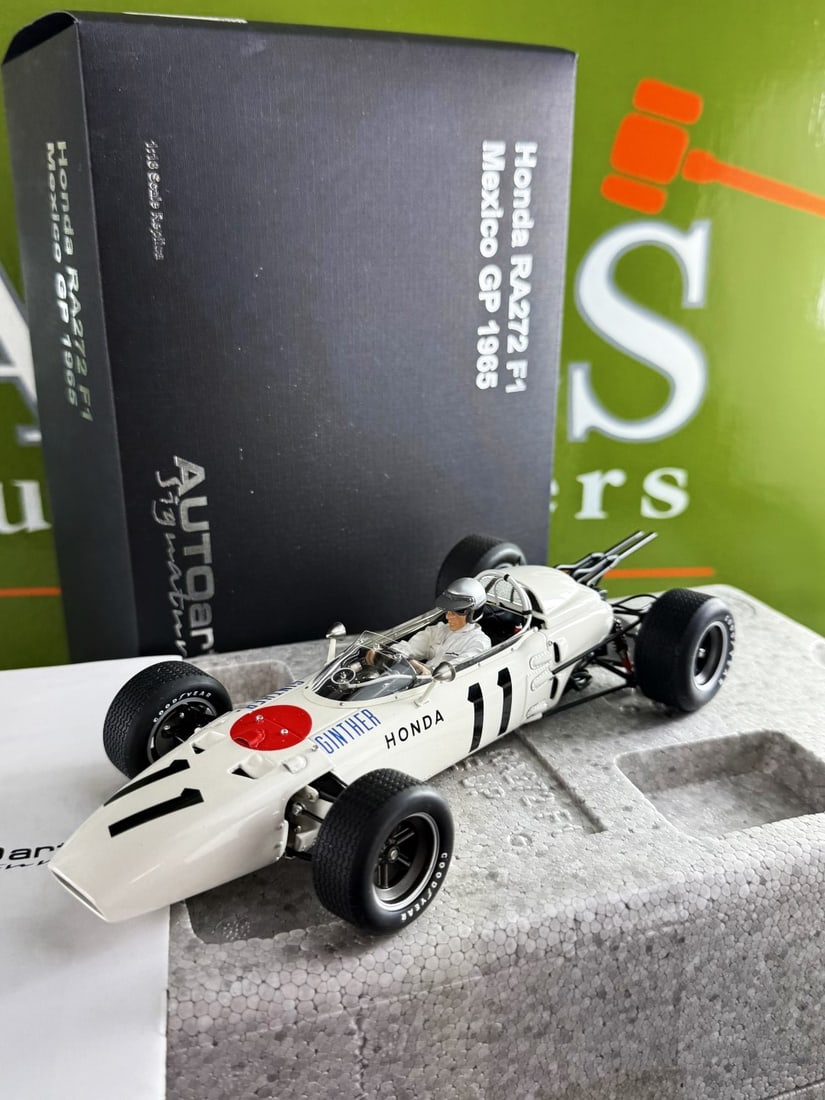Auto Art-1:18 Scale Honda RA272 Mexico F1 GP Winner Special Edition.RrpGBP 425: Auto Art-Honda RA272 Mexico F1 GP Winner Special Edition.- A rare undisplayed example complete as pictured with original packaging-Mint Example.Opened for pictures only.