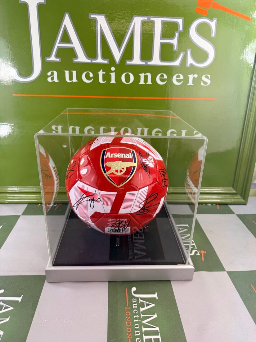 Arsenal FC Signed 2025-26 Premier League Champions Football In Case: Arsenal FC Signed 2025-26 Premier League Champions Football, signed by all players and and manager Mikel Arteta, supplied with COA.