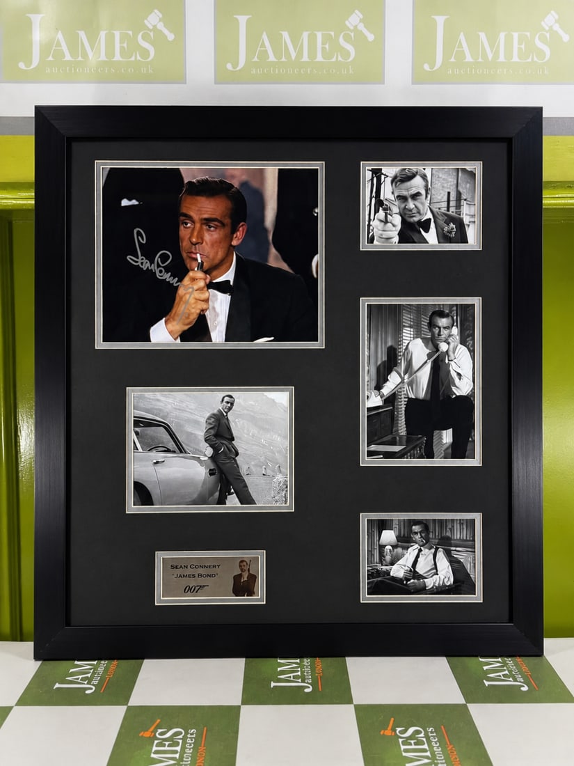James Bond 007 Interest A Sean Connery Signed Autograph Montage.: James Bond 007 Interest - A Genuine Sean Connery Autograph Montage. signed in silver pen on a photograph of Connery in his iconic role as James Bond. Framed and mounted with four other black and