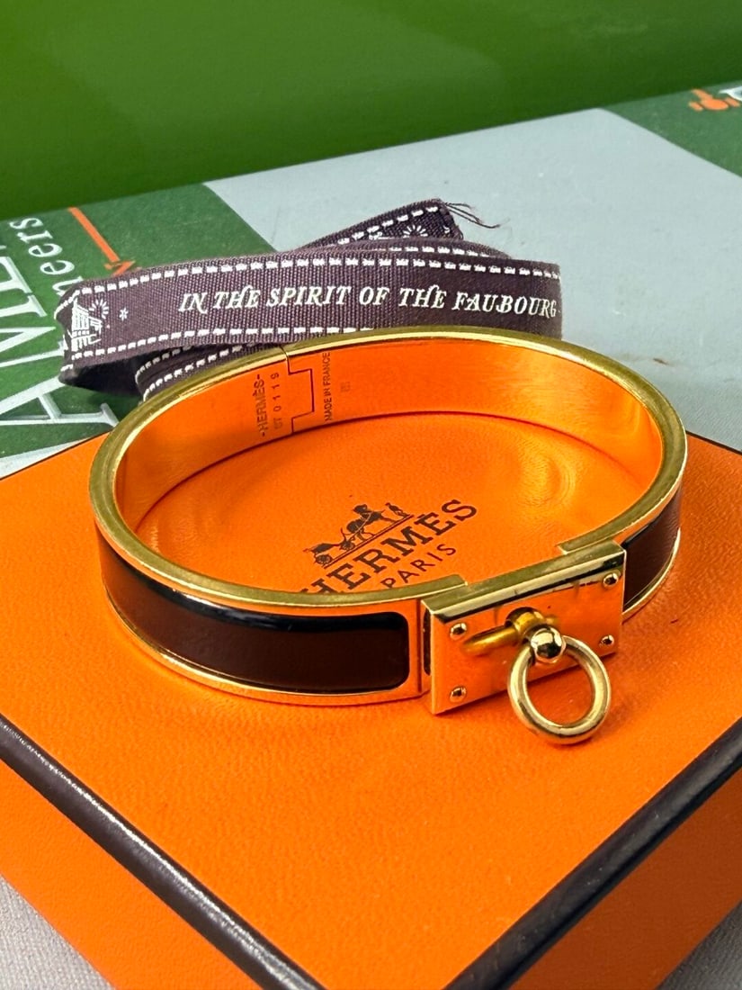 Hermes Paris Iconic Edition Bracelet Gold/Black: Hermes Paris Iconic Edition Bracelet Gold/Black, as pictured rare example circa 90`s in parallel famous click clack design as per the H design