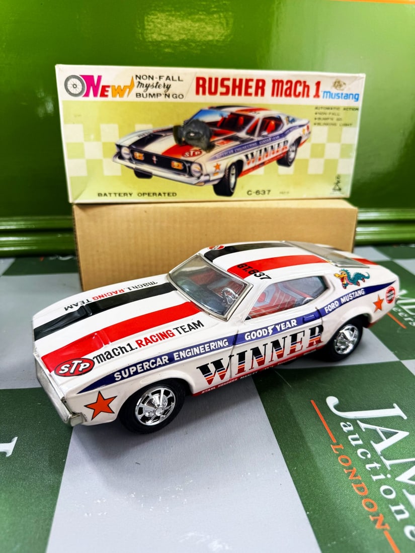 Japanese Tinplate Battery Operated Rusher Circa 1960s Vintage Mach1 Mustang-Rare: Japanese Tinplate Battery Operated Rusher Circa 1960s Vintage Mach1 Mustang-Rare example with original packaging as pictured.