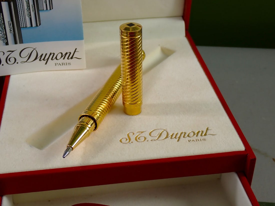 St Dupont Vintage Gold Ballpoint Pen`Lady Mascara` Edition: St Dupont Vintage Gold Ballpoint Pen`Lady Mascara`Edition, rare complete example as pictured with original inner and outer packaging, velvet pouch. Gold tone.