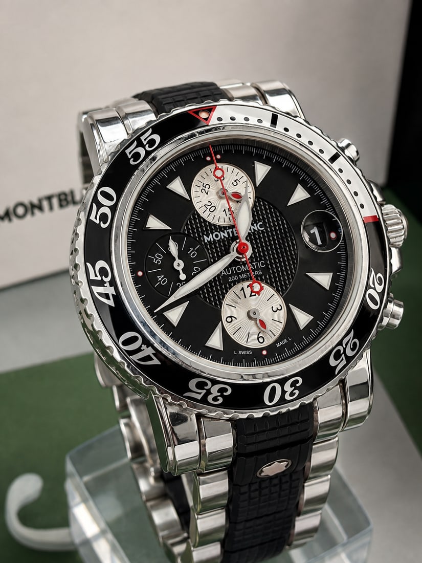 Montblanc Meisterstuck 7034 Black Sports Chronograph Date Automatic-Rare Example: Montblanc Meisterstuck 7034 Black Sports Chronograph Date Automatic-Rare Example spare links, outerbox along with MB bag included, single owner watch from new. working at time of lotting.Crystal:
