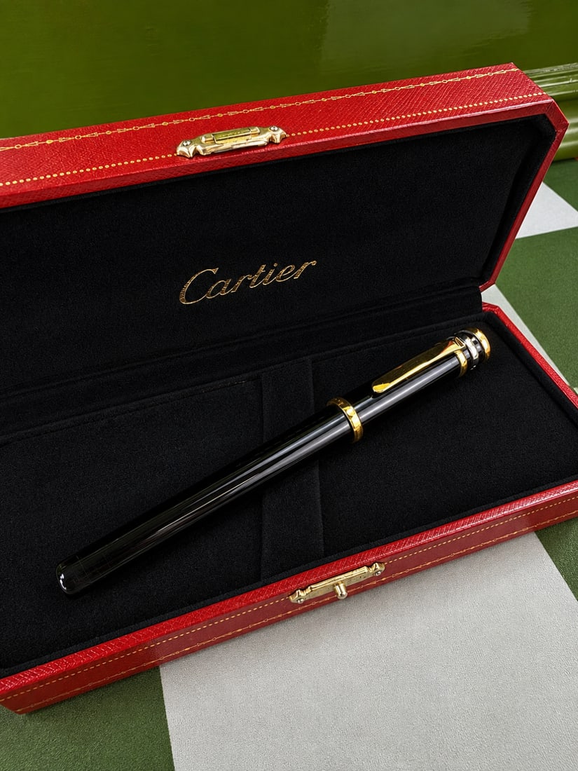 Cartier Vintage `Trinity De Cartier` Rollerball Pen-Tri Colour Gold: Cartier Vintage `Trinity De Cartier` Rollerball Pen-Tri Colour Gold interlocking yellow, white, and rose gold bands positioned at the top.Circa 1980`s-rare example
