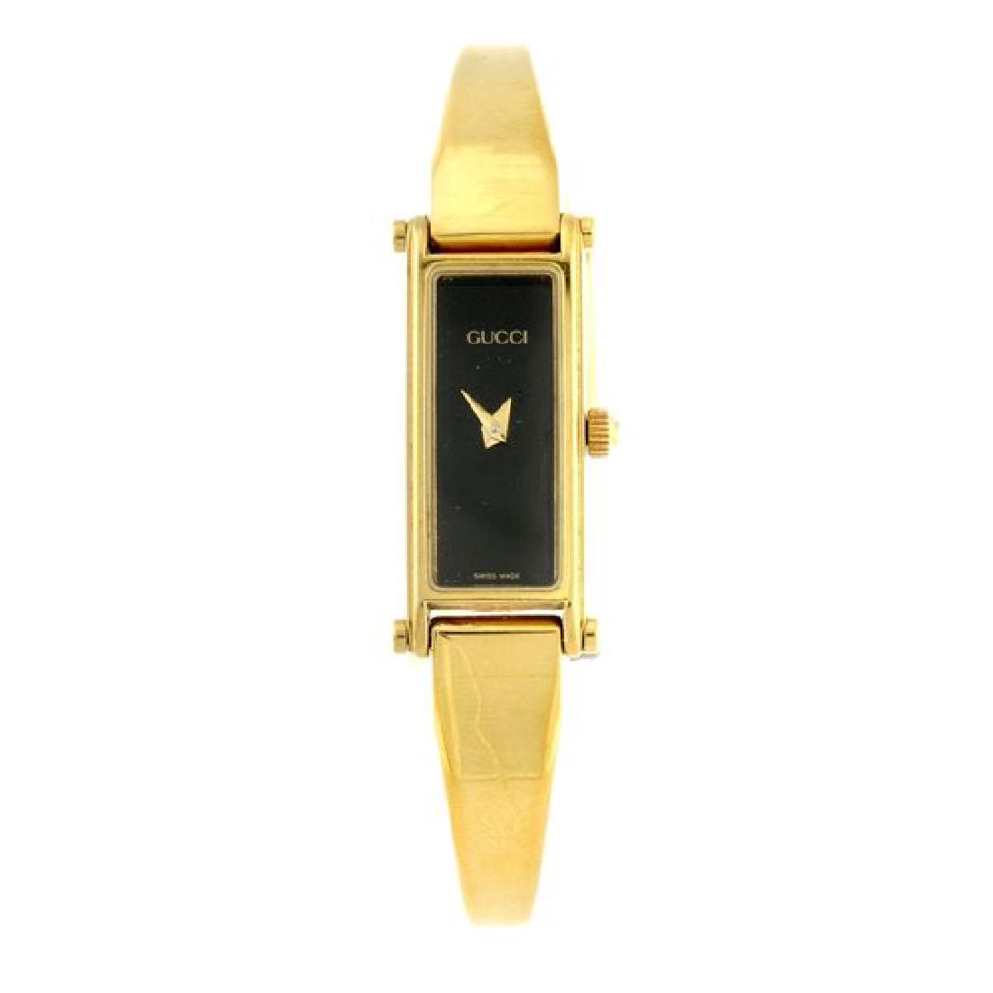 A Lady`s Gucci 1500l gold plated watch 